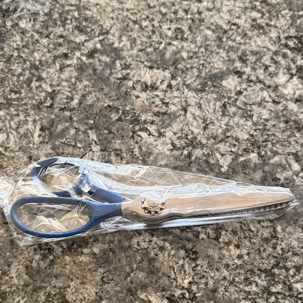 Stainless Steel Scissors with Blue Handles
Pinking Shears